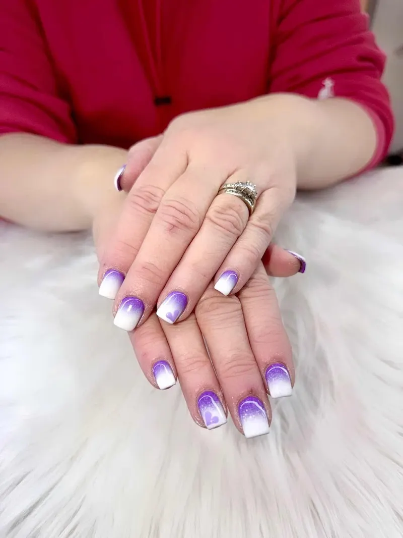 Pink and white nails with a clean, polished look