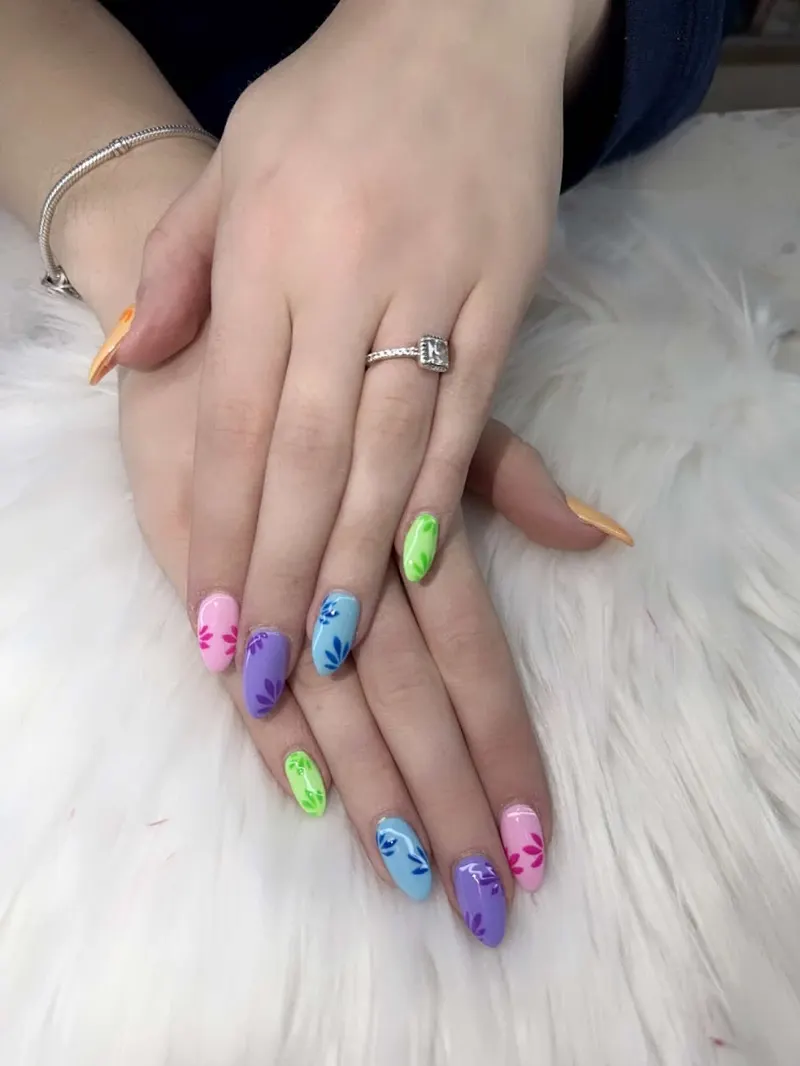 Playful rainbow tip nails with a glossy coat