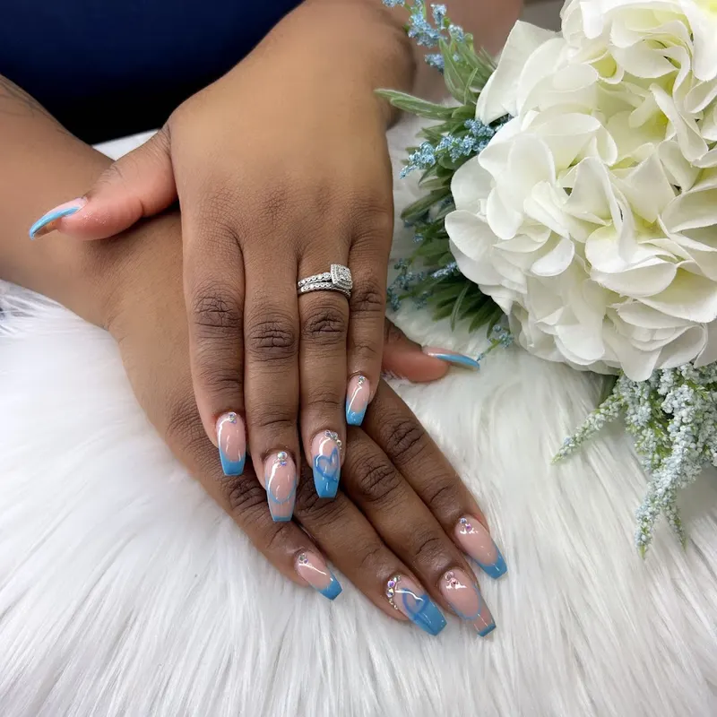 Colorful nail art styled with fresh white hydrangeas