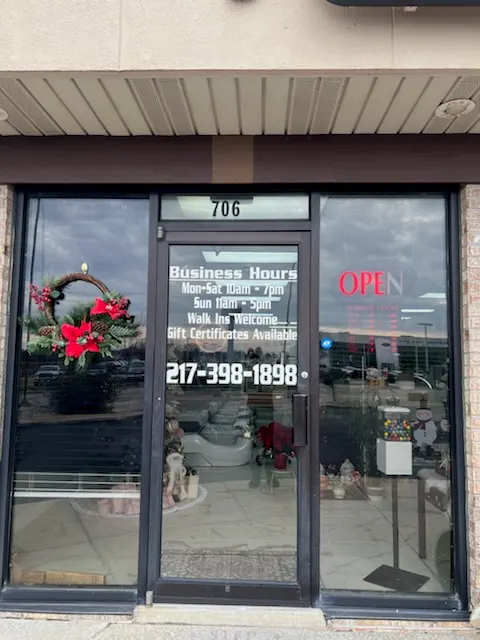 Entrance to Beauty Nails Spa at 706 W Marketview Drive in Champaign, with business hours posted
